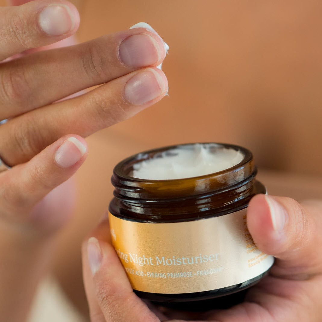 beeautify-model-holding-open-balancing-night-moisturiser-1